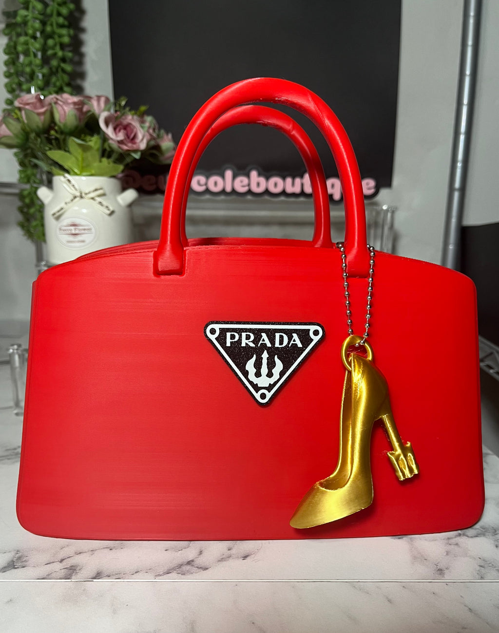 Prada-Inspired Red Handbag Decor with Gold Heel Charm
