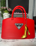 Prada-Inspired Red Handbag Decor with Gold Heel Charm